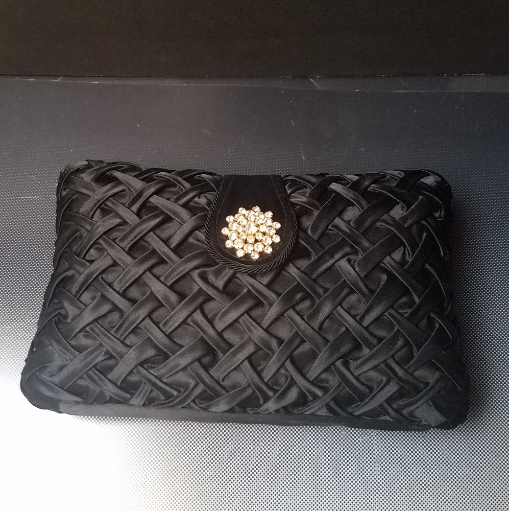 black evening bag with unique rhinestone closer
